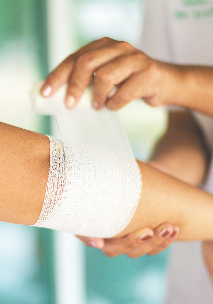 d3 bandage being applied to an arm